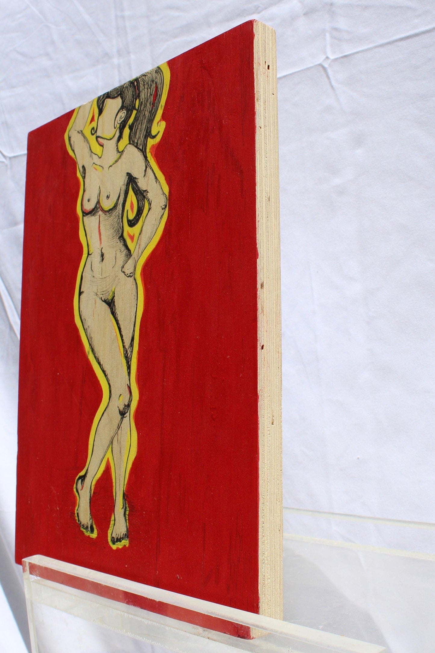 side view of illustration of nude pen drawn woman with yellow outline and red background