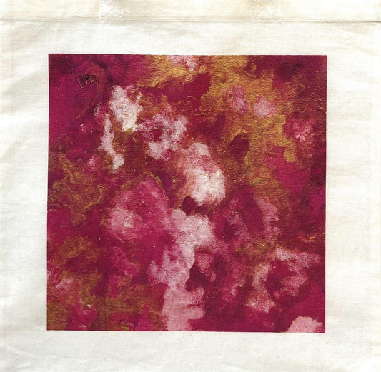 Close up of canvas tote bag with pinks, white, and gold abstract art